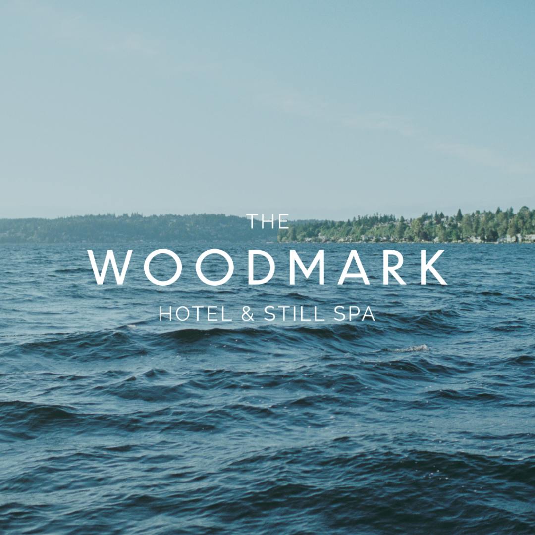 Logo for The Woodmark Hotel & Still Spa