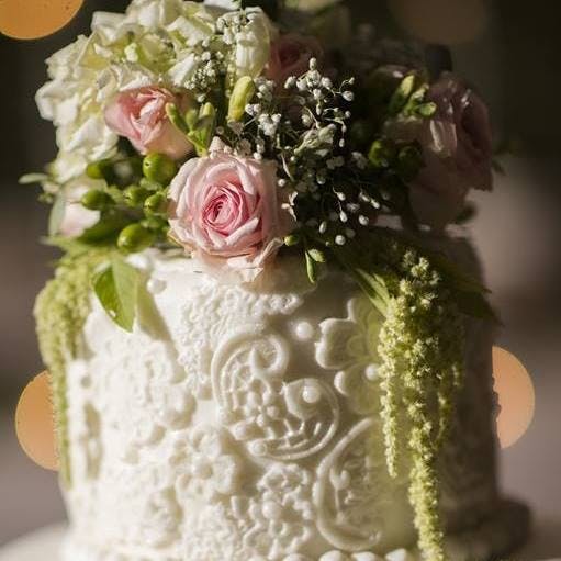 Logo for Creative Designs Floral and Events