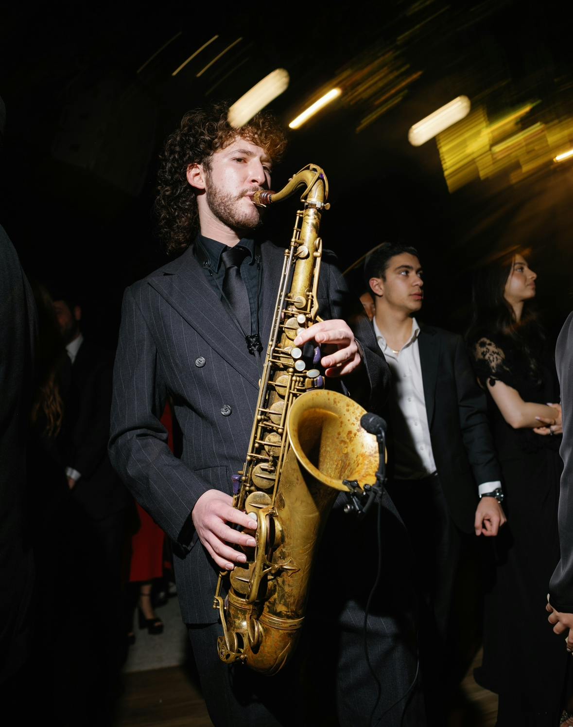 Logo for Aiden on Sax