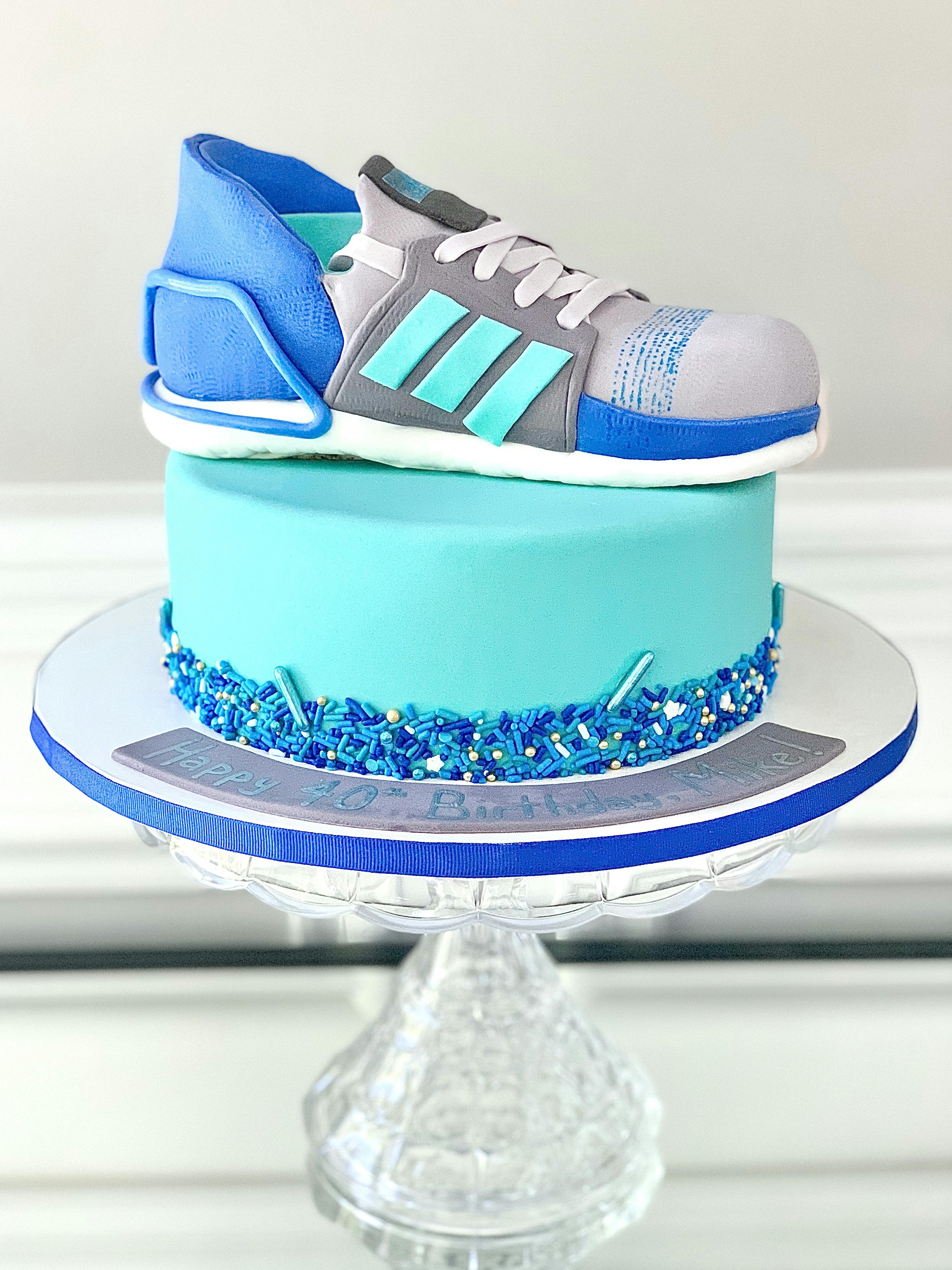 Adidas themed cake for a client 😊😊😊... has chocolate, vanilla, and red  velvet layers with whipped frosting. . . . . #adidascake #adidasthemecake # adidas... | By Royal Queen Cakes and Pastries | Facebook