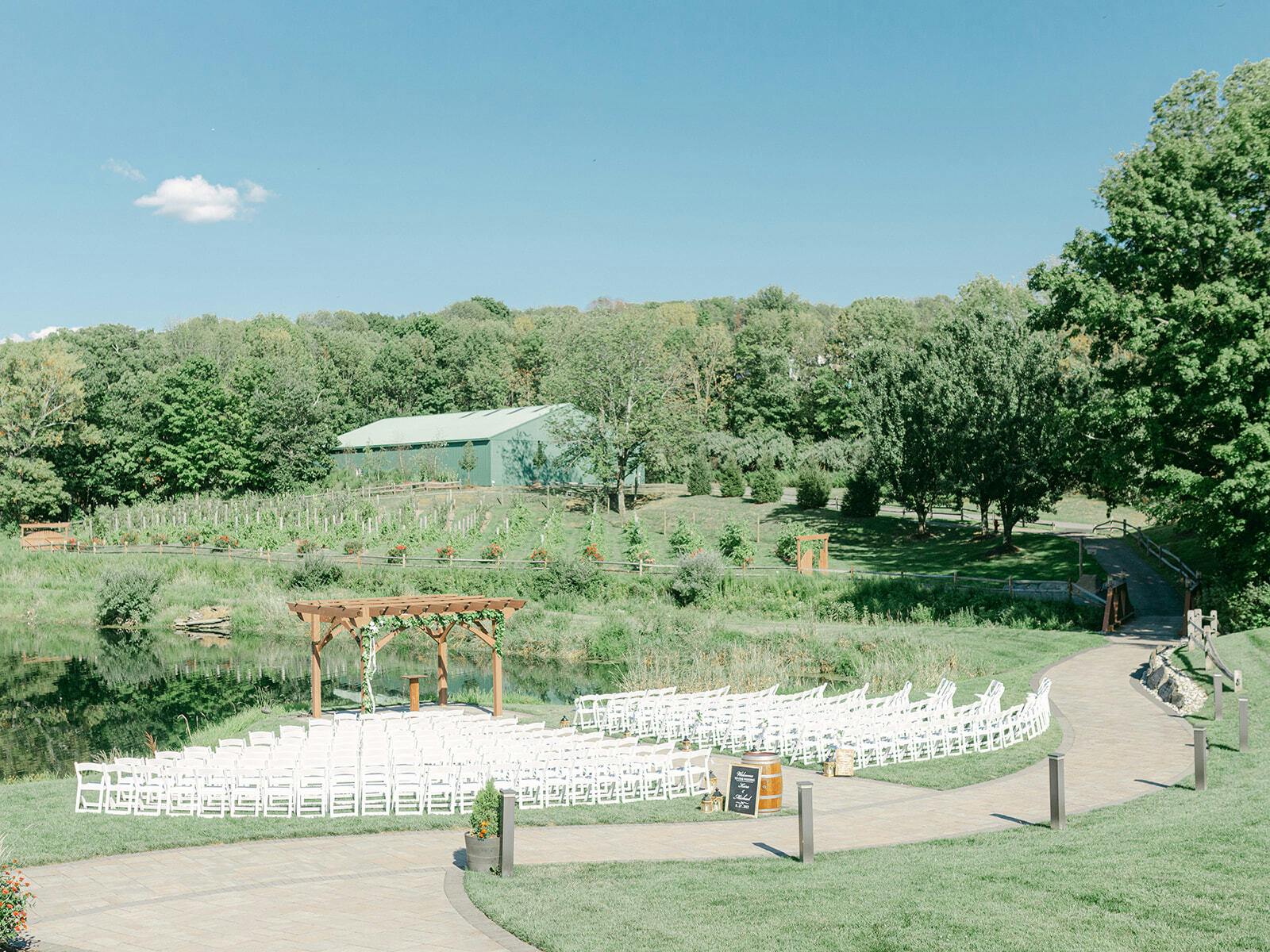 Romantic Waterside Ceremonies Along a Vineyard, Winery event space at Bear Brook Valley