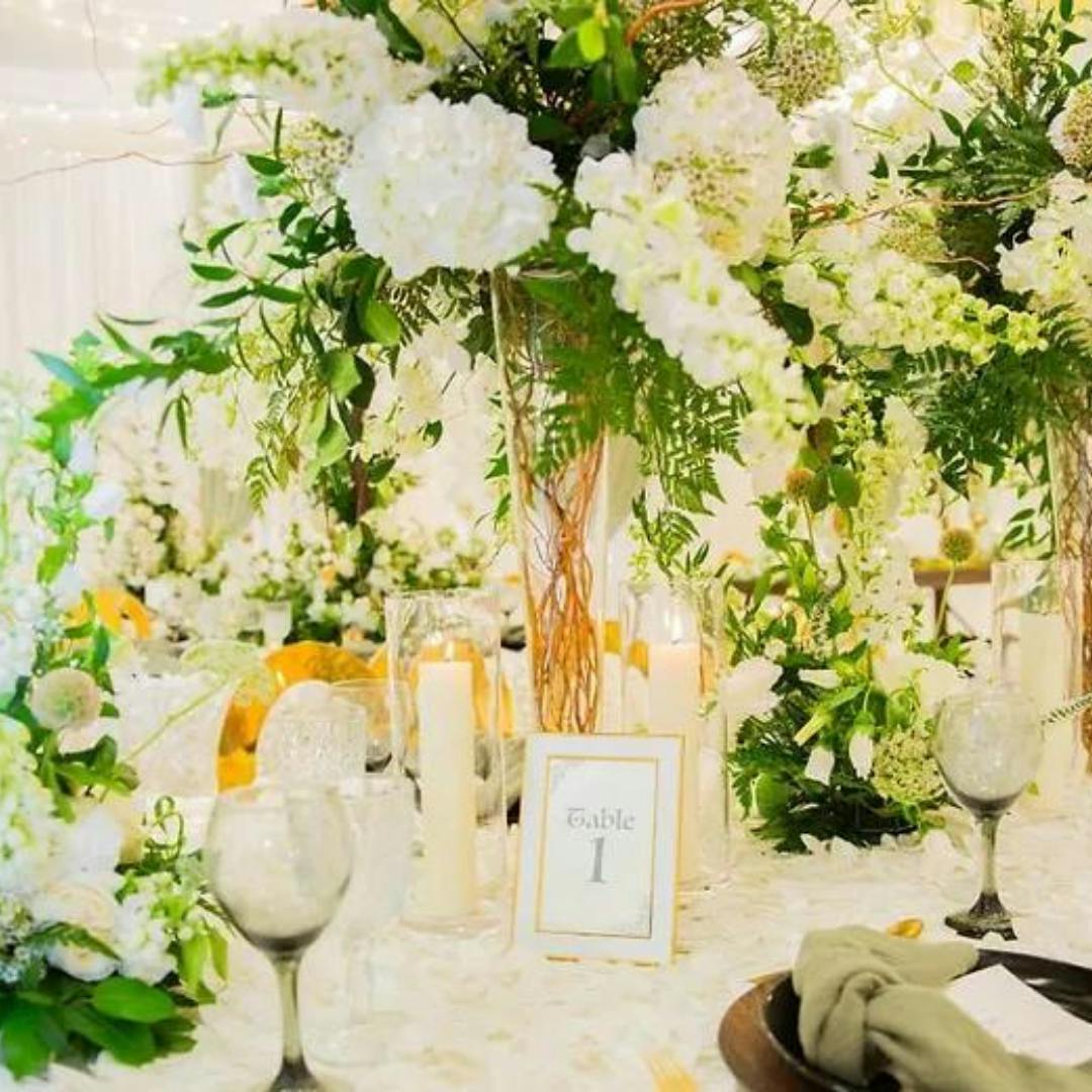 Featured photo from White-Green Florals & Luxe Gold Chairs