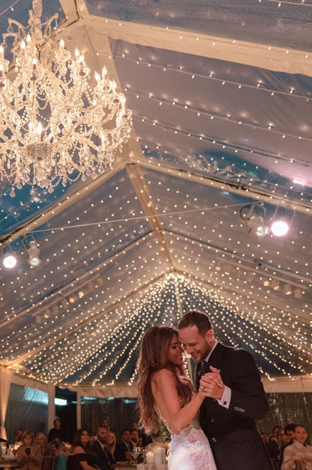 Featured photo from Raquel & Dylan Dancing in the rain & it was beautiful -Wedding