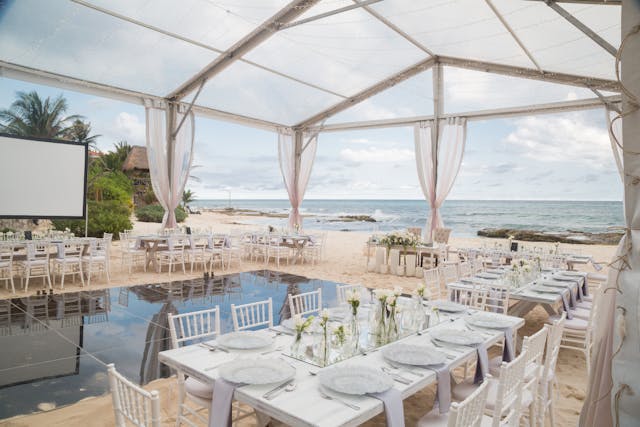 Featured photo from Tented Beach Wedding