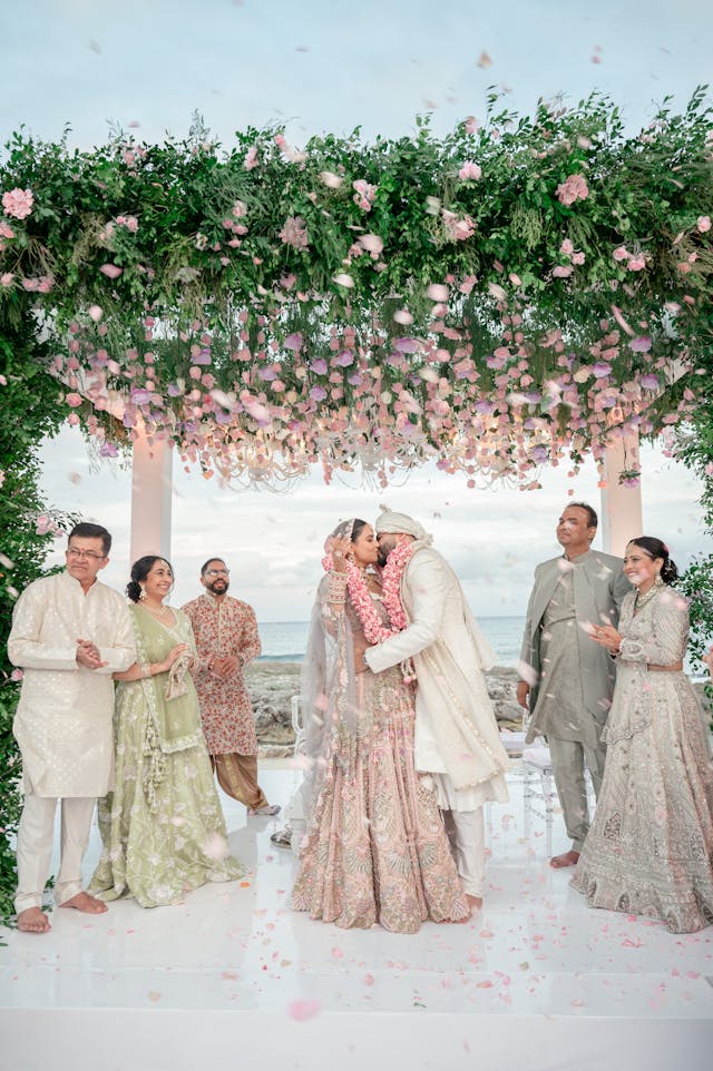 Featured photo from A Vibrant Hindu Wedding with Blush Florals and Beachside Views