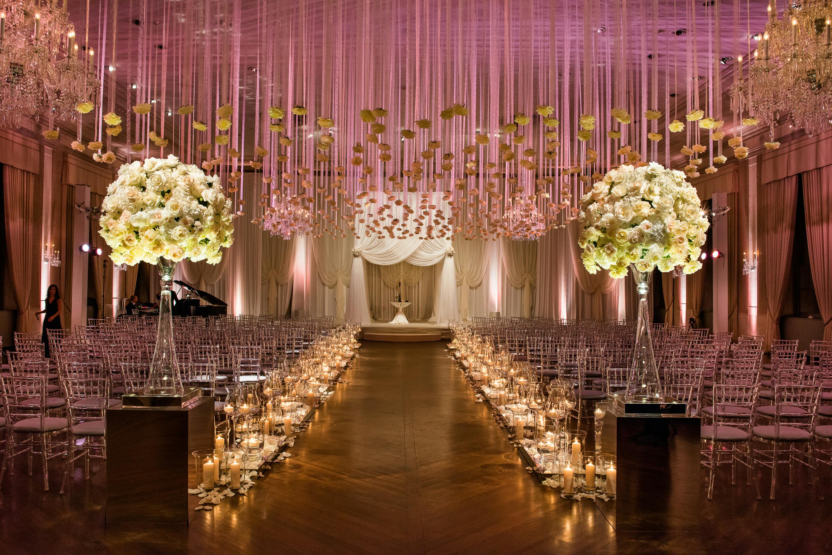 Hmr Designs Weddings Partyslate Individual Roses Were Strung And Suspended Above A Candlelit Aisle Strewn With Ivory Petals For