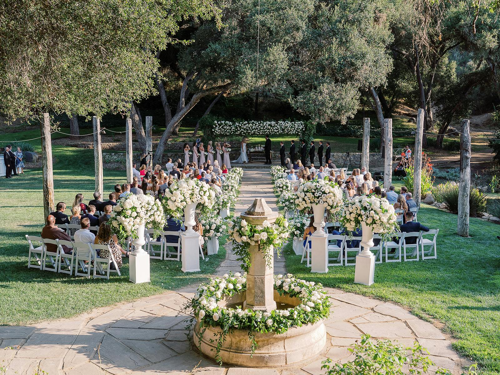 Featured photo from Experience This Tranquil Garden Wedding at Vista Valley Country Club with Romantic Details and a Neutral Palette