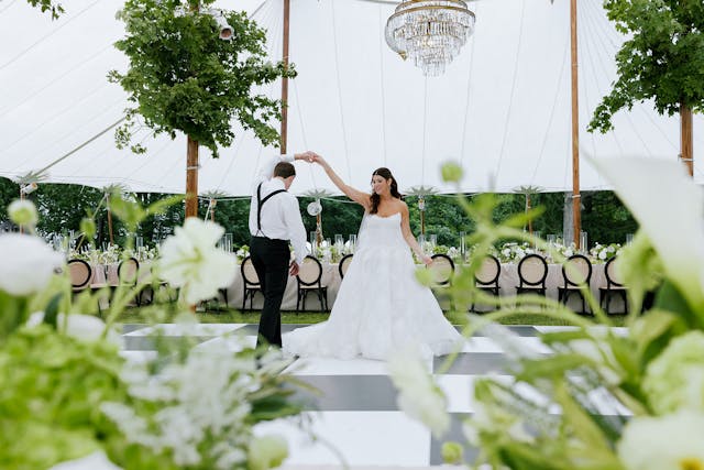 Featured photo from A Timeless Tent Wedding with Classic White Florals in Hudson, NY
