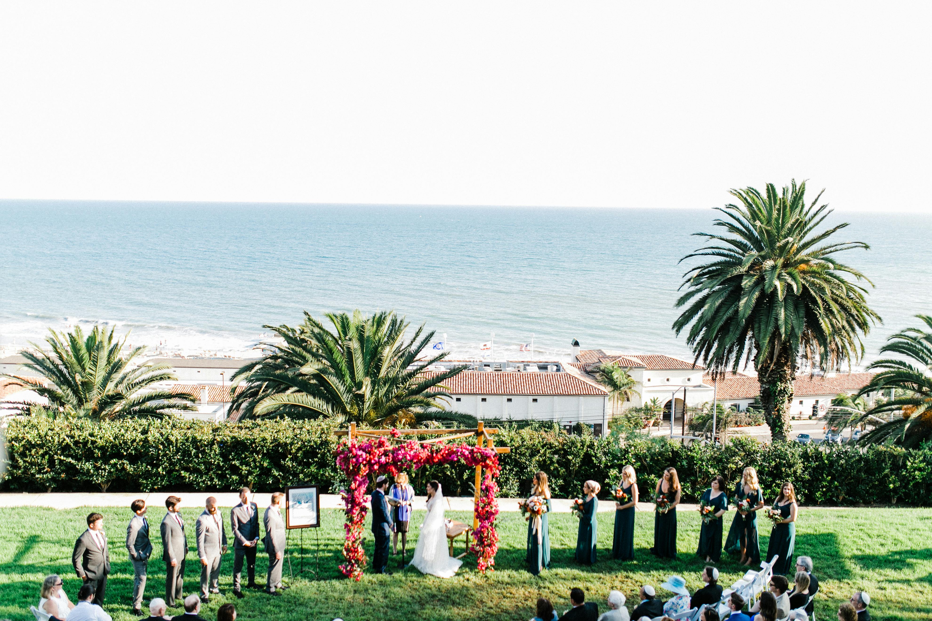 Featured photo from Colorful Tropical Jewish Bougainvillea Wedding at Bel Air Bay Club