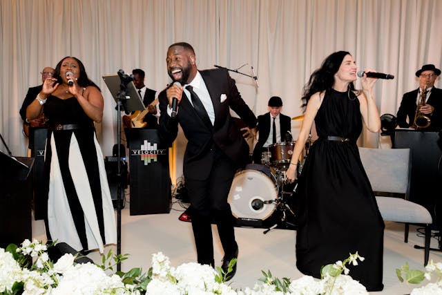 Featured photo from Witness This Classic Wedding with Gilded Elegance and Velocity Band at Four Seasons Hotel Chicago