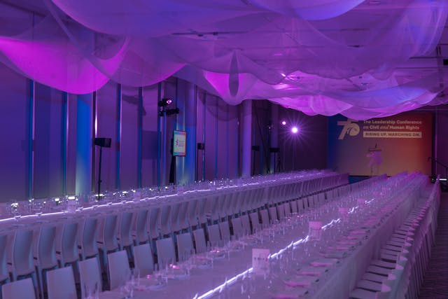 Featured photo from Explore This Leadership Conference at the International Spy Museum with Ceiling Installations and Refined Decor