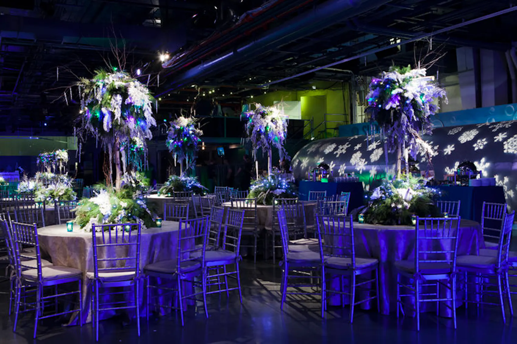 dramatic center pieces in a dim lit ballroom