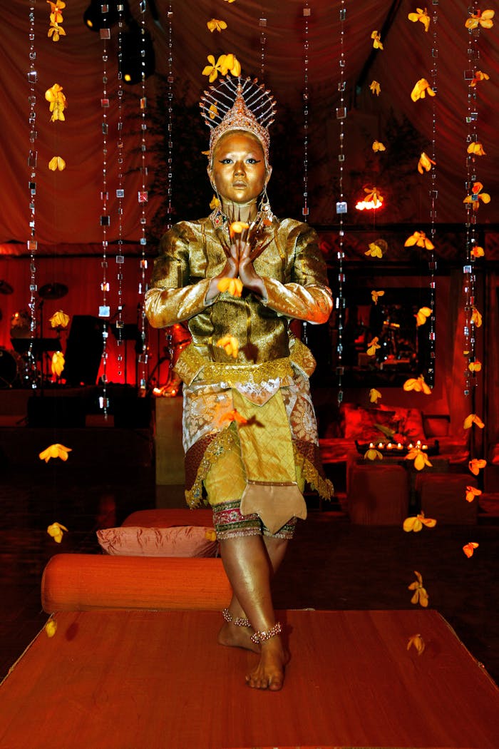 Man dressed in gold costume at corporate event | PartySlate