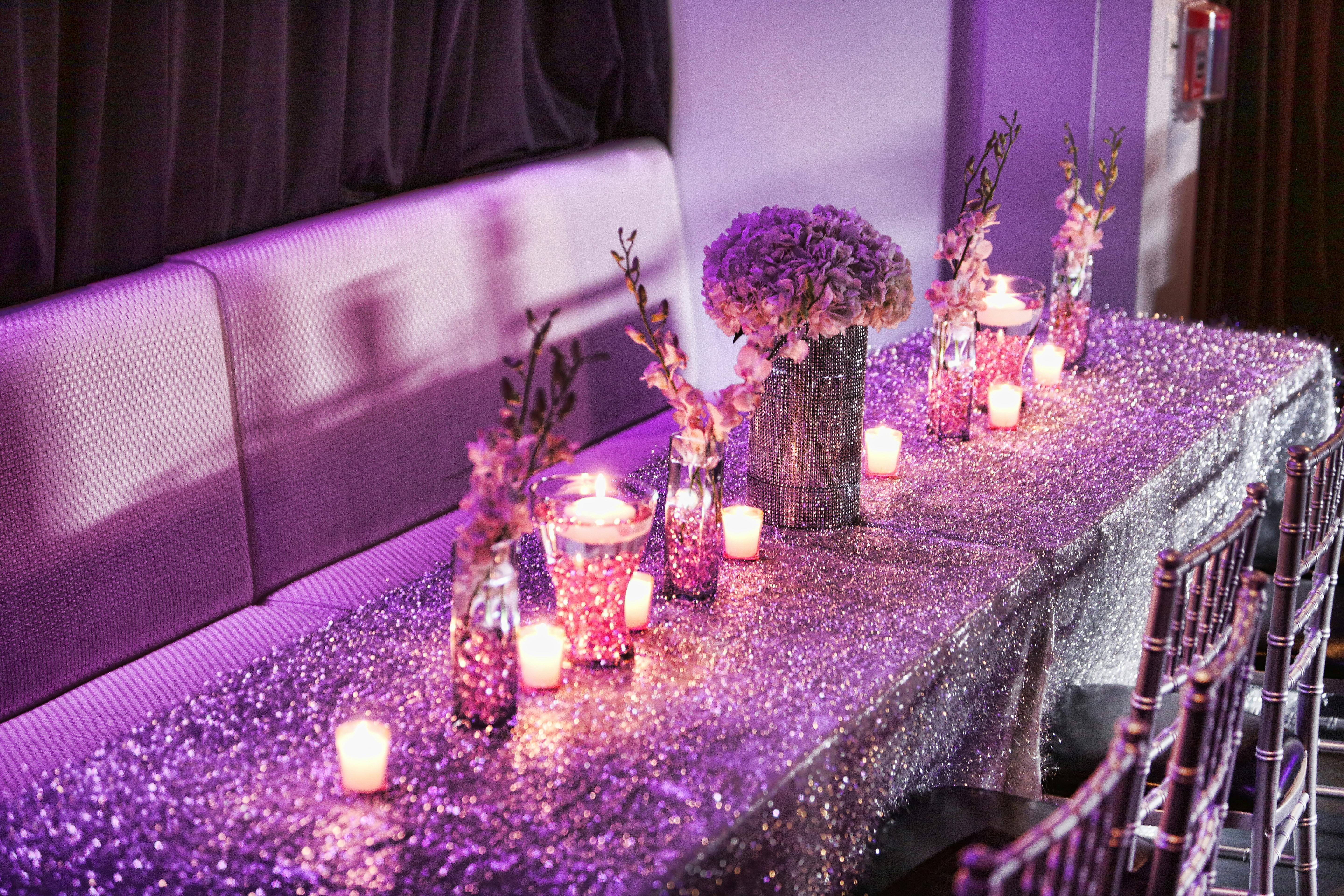 Candlelit tablescape with glitter tablecloth