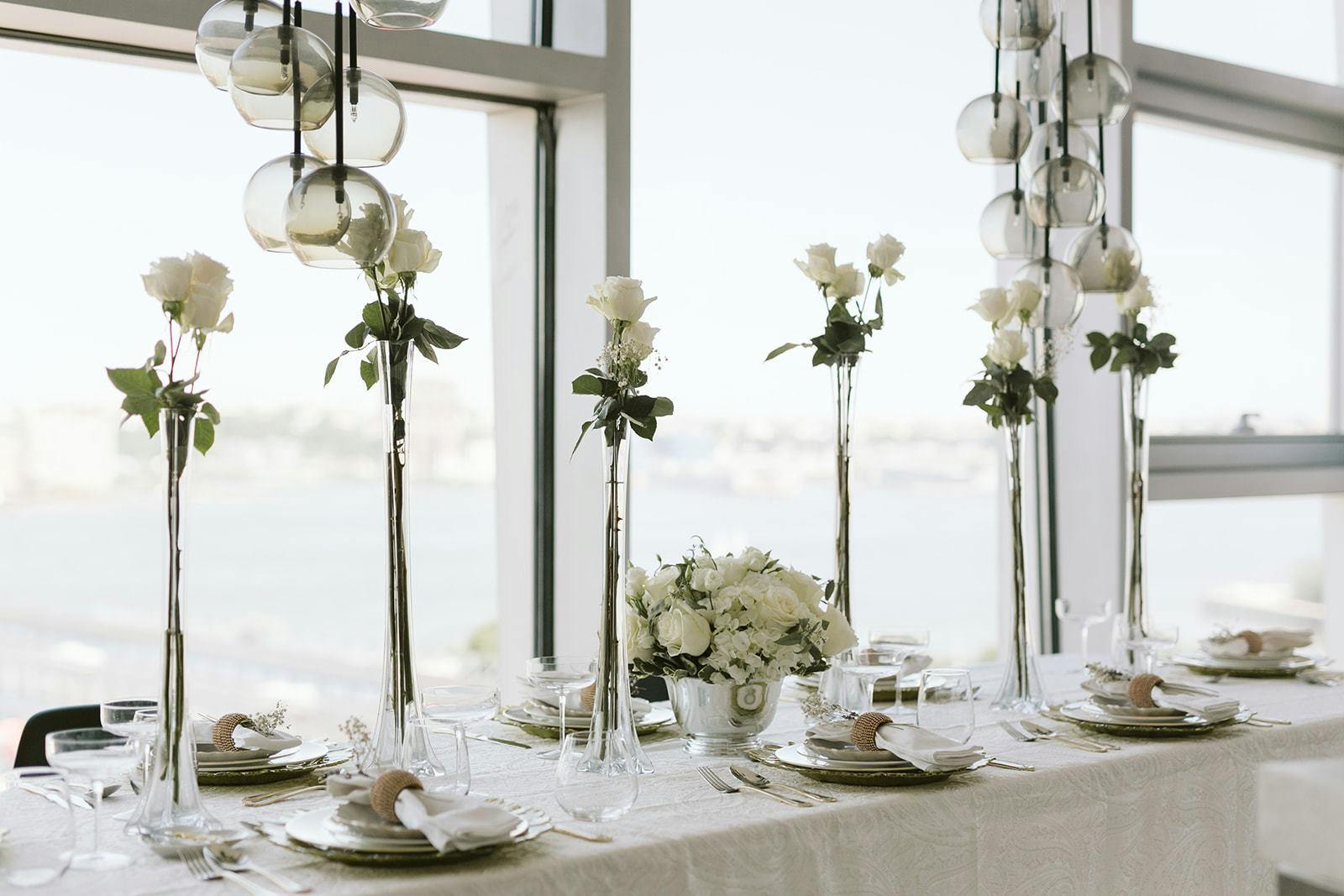 An all white color palette looks out the bright windows. 