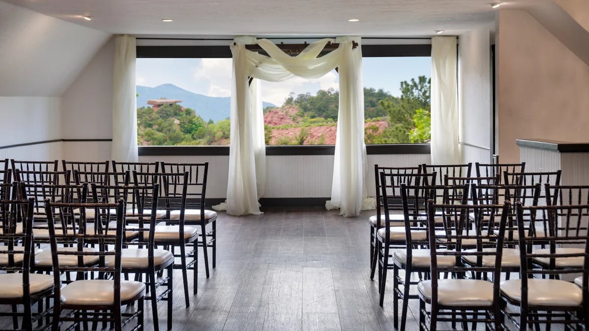 Indoor Ceremony (Pikes Peak Room), an event space at Craftwood Peak by Wedgewood Weddings