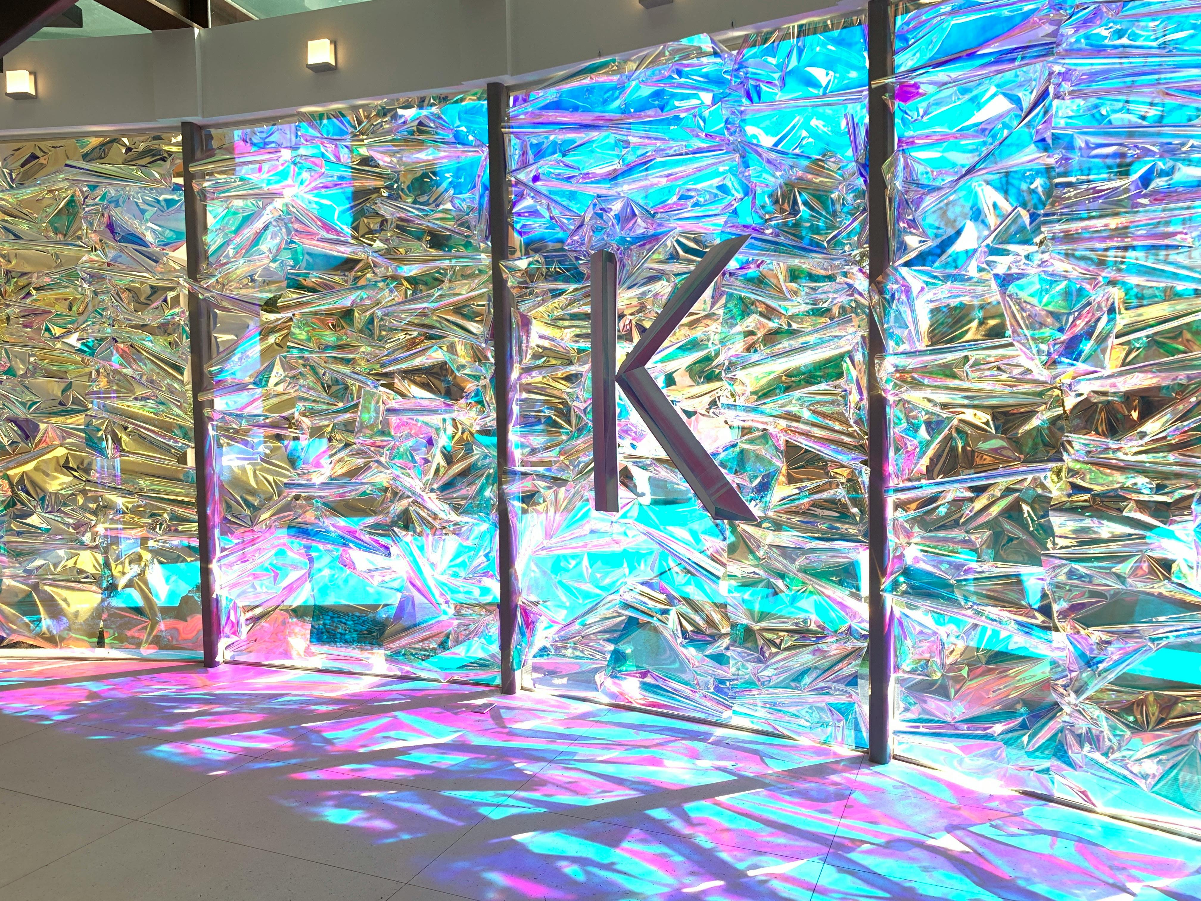 Opalescent backdrops paired with iridescent uplighting