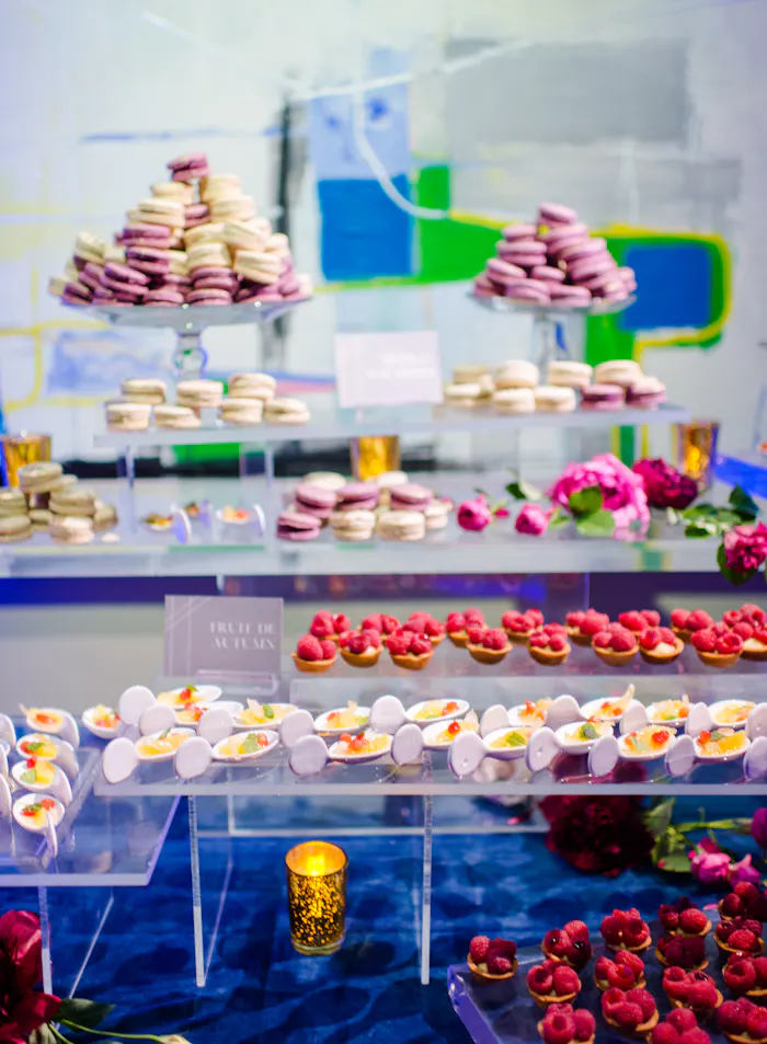 A dessert table with colorful entries