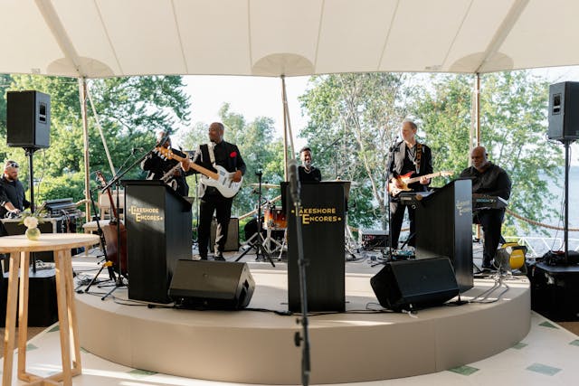 Featured photo from Dance the Night Away at this Spirited Tented Wedding with a Live Band in Chicago