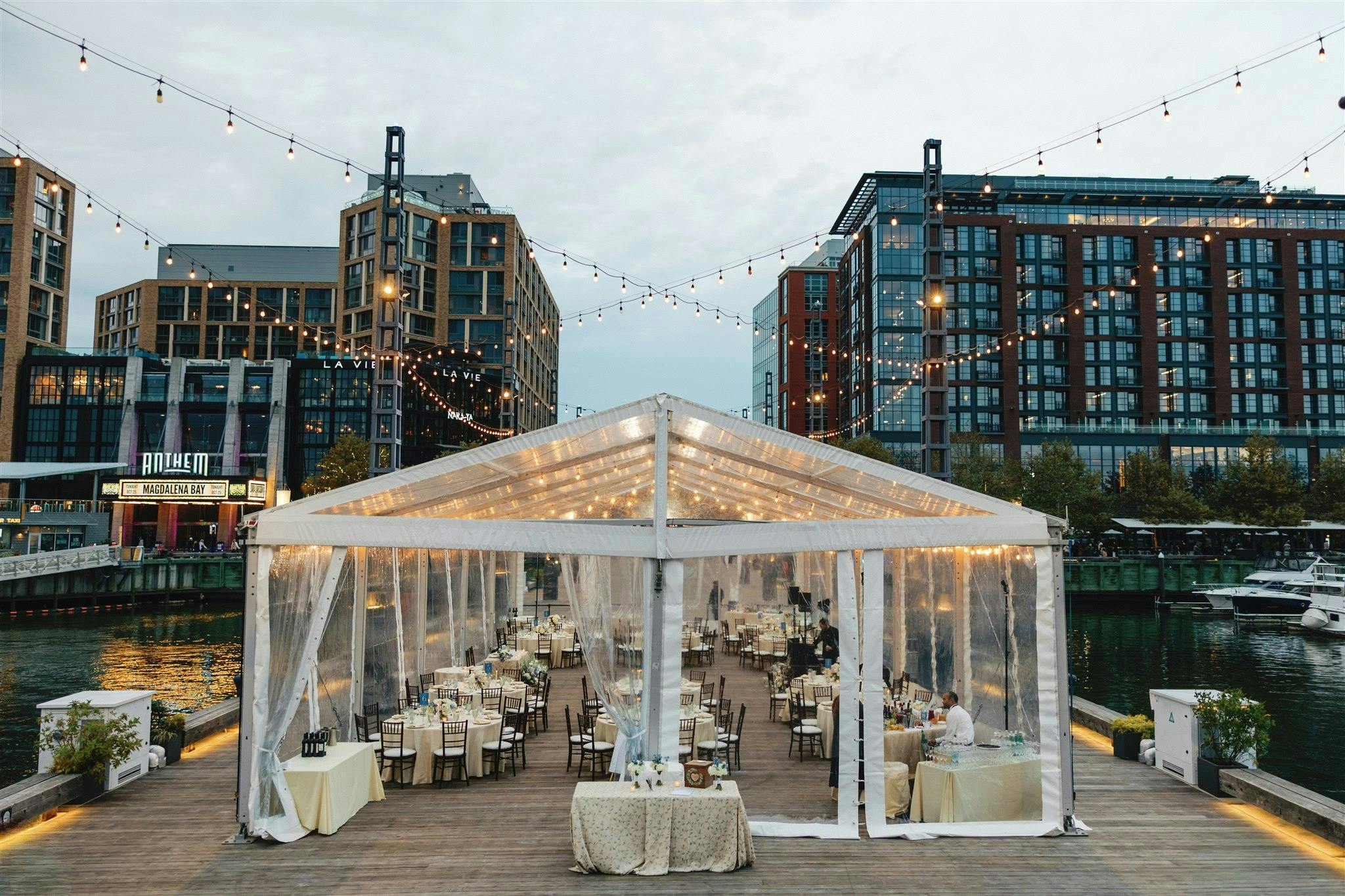 Featured photo from Experience This Waterfront Washington DC Wedding with a Clear-Top Tent and Layered Floral Design