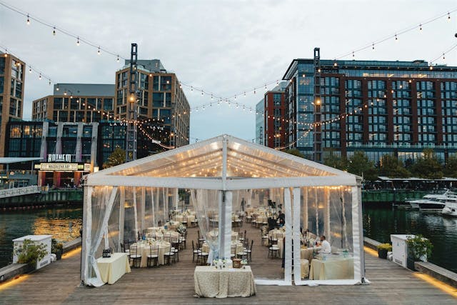 Featured photo from Experience This Waterfront Washington DC Wedding with a Clear-Top Tent and Layered Floral Design